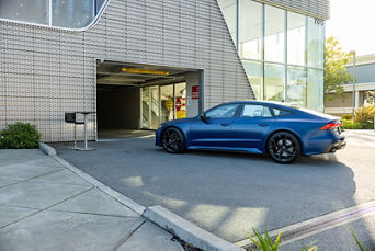 2025 Audi RS7 pulling into garage