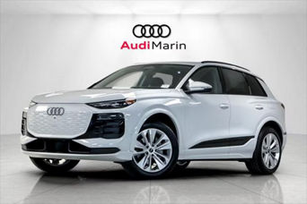 front facing 2025 Audi Q6 e-tron in a showroom