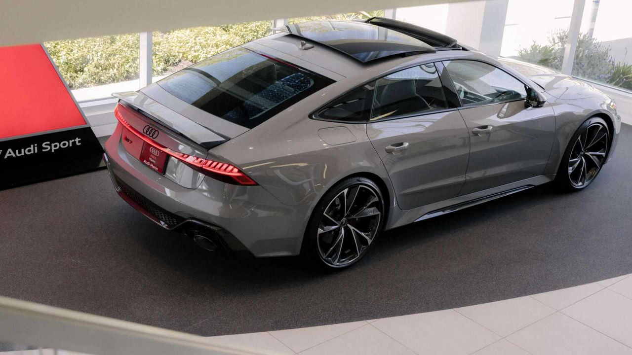 Side profile of an Audi RS7 parked.