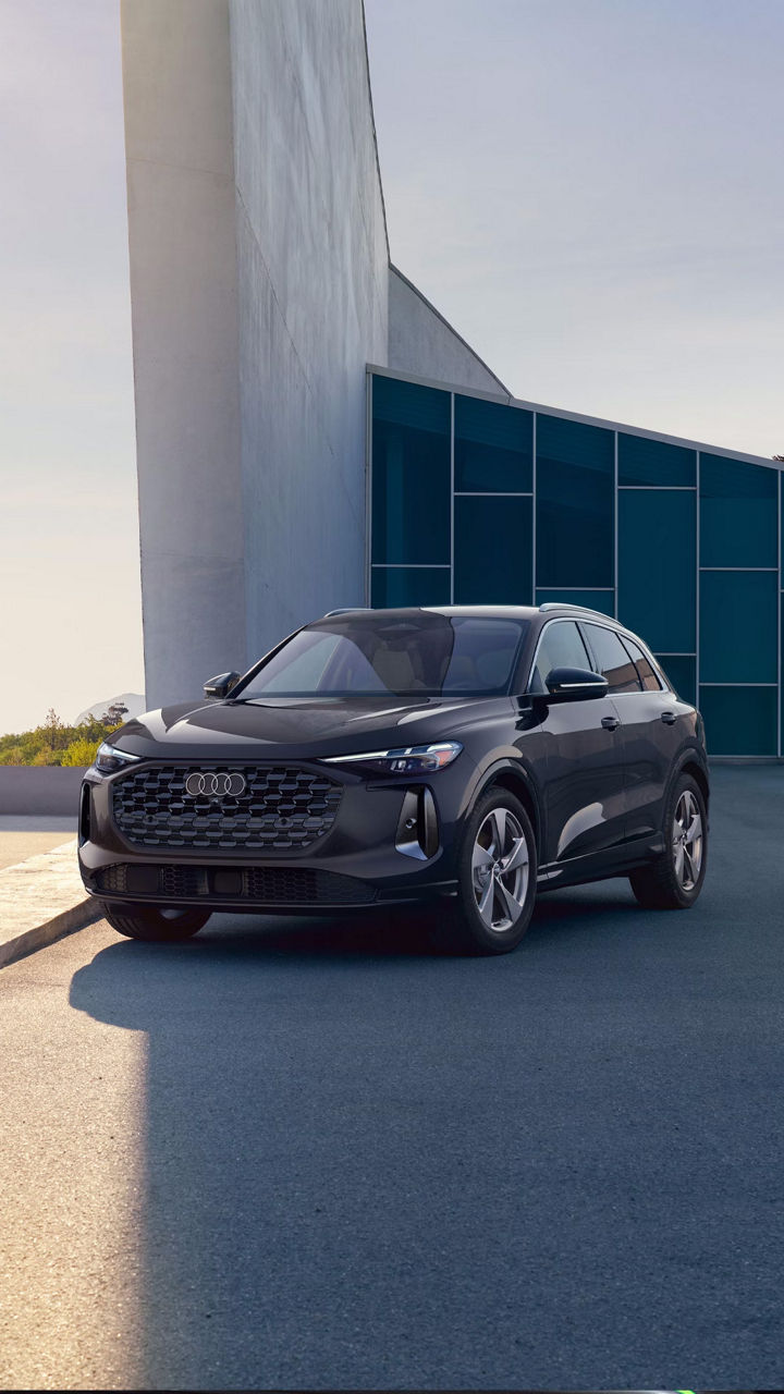 Configurations for 2025 Audi Q5 trim levels parked on a pier