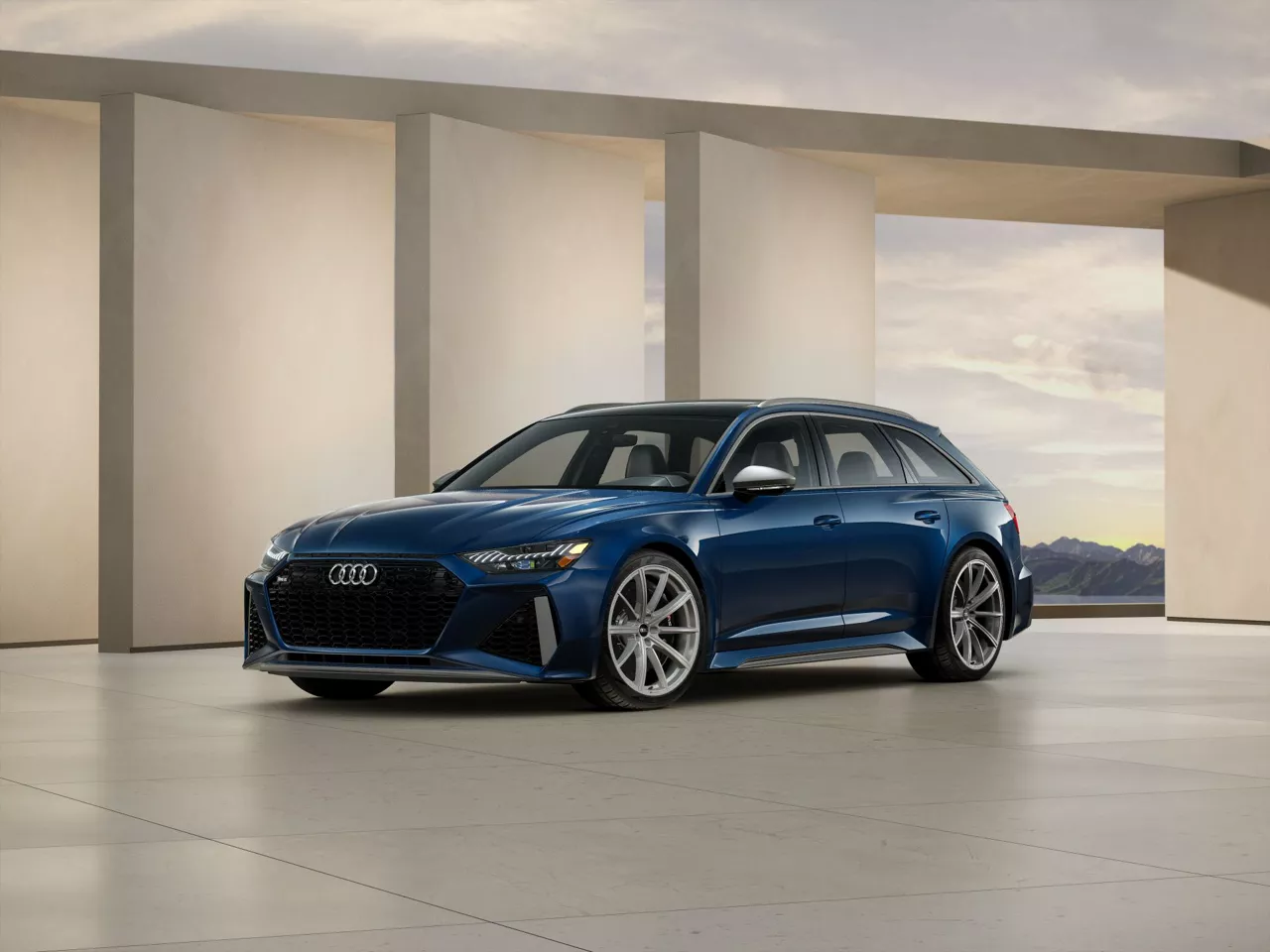 2026 Audi RS 6 parked on a dirt lot with the Golden Gate Bridge in the background