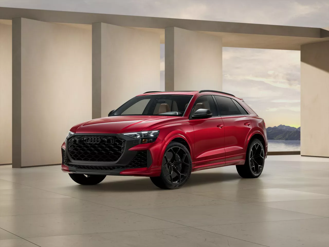 2026 Audi RS Q8 Performance trim level in red parked by modern structure