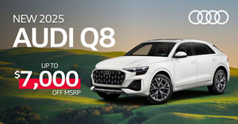 Side profile view of an Audi Q8.