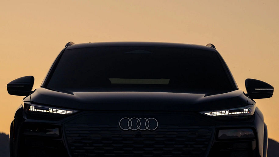 Front profile view of an Audi parked.