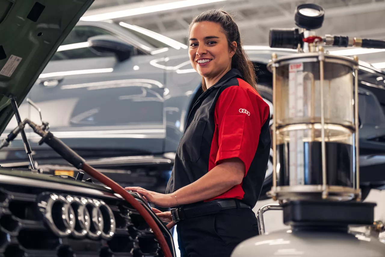 Audi Technician smiling at camera