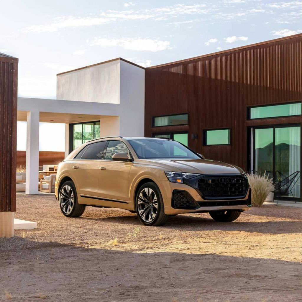 Three quarter view of an Audi Q8 SUV parked.
