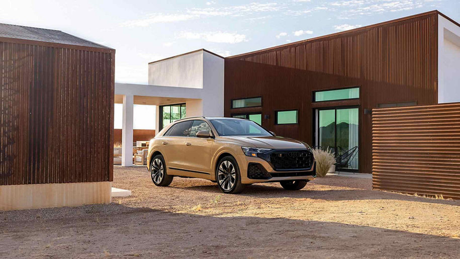 Three quarter view of an Audi Q8 SUV parked.