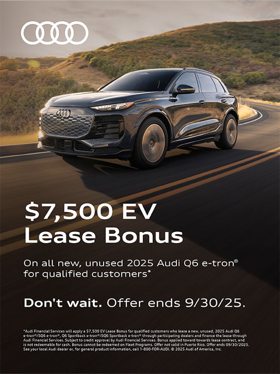 Audi Q6 etron side profile driving