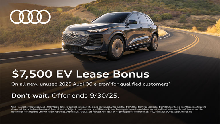 Audi Q6 etron side profile driving