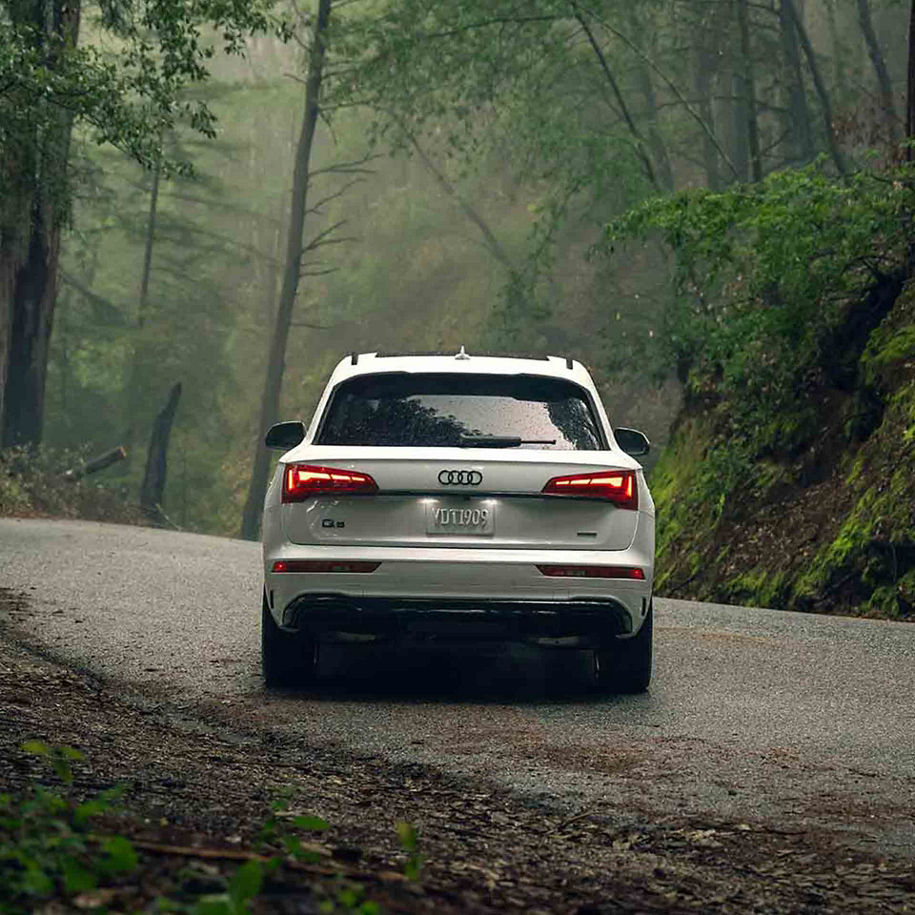 Rear profile view of an Audi Q5 parked.